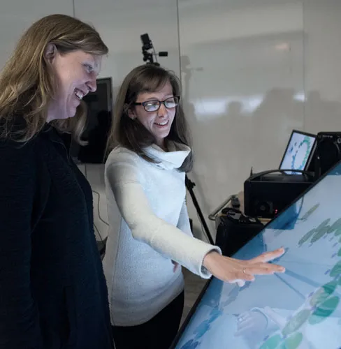 People looking at Data Visualizing Tool